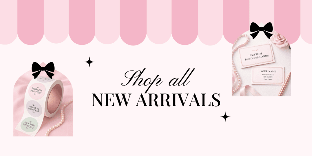 A promotional graphic with a pink and white striped top border, featuring rolls of custom stickers on the left and business cards on the right. The text in the center reads Shop all NEW ARRIVALS.