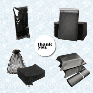 A variety of black packaging materials displayed on a light blue patterned background, including poly mailers, bubble mailers, shredded paper, drawstring bags, shipping bags, and a “thank you” sticker in the center.