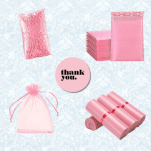 A collage of pink packaging supplies: shredded filler, bubble mailers, a mesh drawstring bag, rolls of plastic bags, and a round sticker reading thank you. Background is light blue with a subtle floral pattern.